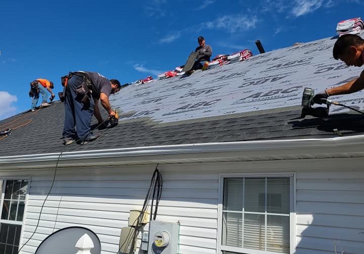 an experienced team of experts working on roofing florence county