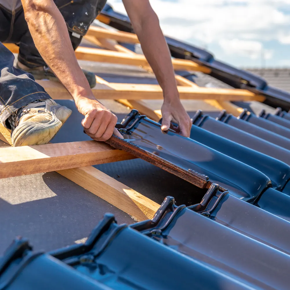skilled worder repairing damage roof repair florence county