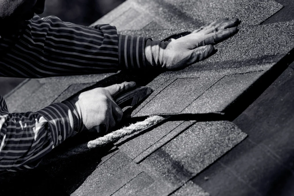 Expert roofing team evaluating materials for efficient installation in Mullins, SC